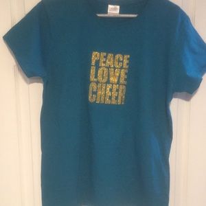 Women’s original tee. “Peace. Love. Cheer.